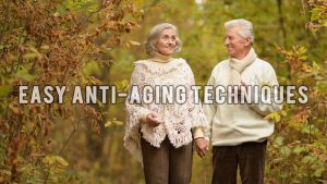 Elderly Couple walking in woods