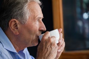 man drinking coffee