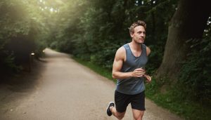 young man running at the park