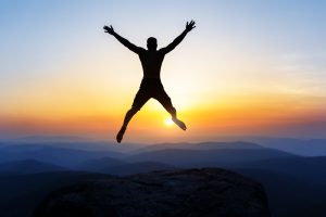 happy man jumping for joy