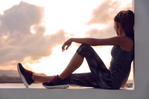 woman relaxing at sunset