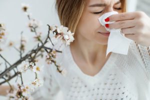 woman suffering from allergies