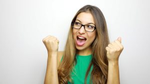 Self determined woman with glasses looking to the side with clen