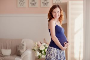 Home portrait of pregnant woman